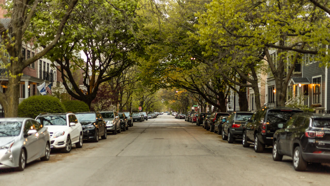 cars parked on side of the road during daytime